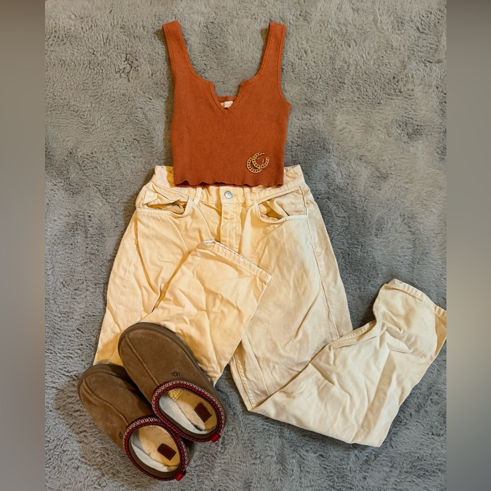 Vintage cream RV jeans. Sourced from a vintage store in San Francisco